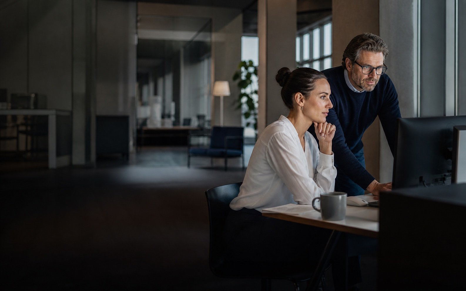 Operations leaders reviewing an AI-assisted workflow
