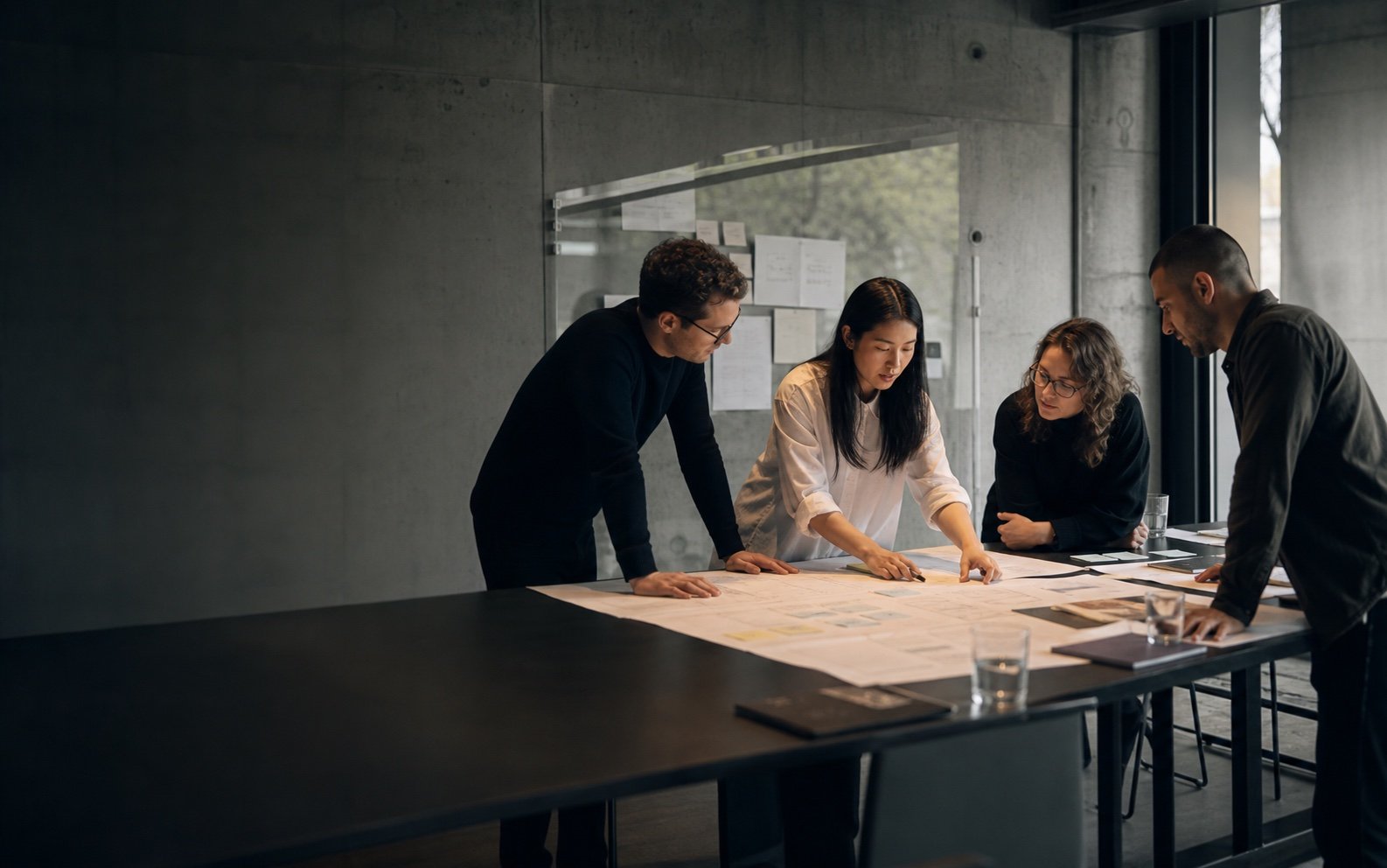 Consulting team mapping a practical delivery process
